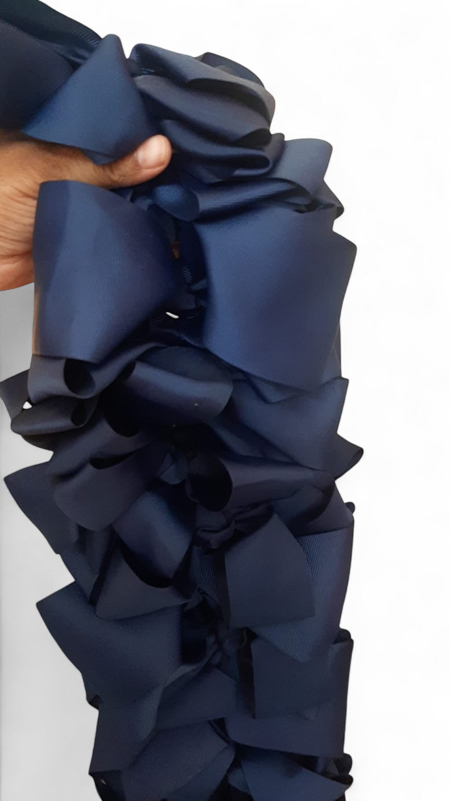 Large dark blue bow