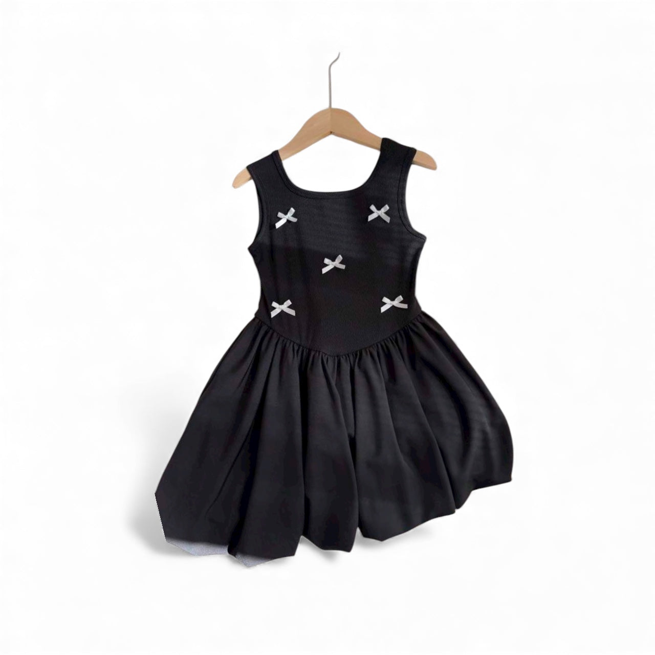 Black dress with white bow