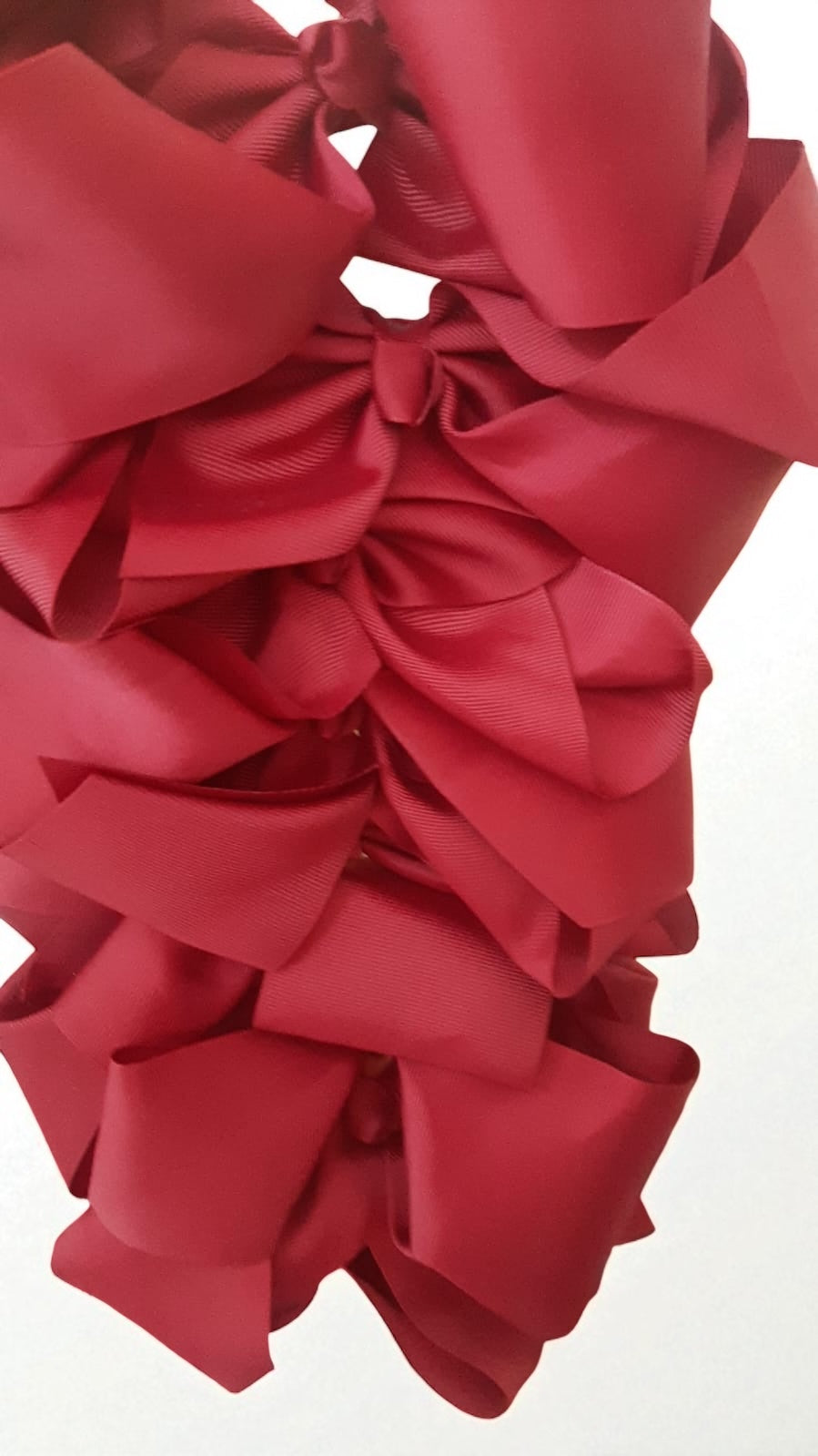 Large burgundy bows