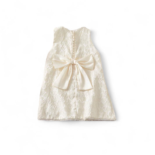 Beige bow at back girls dress