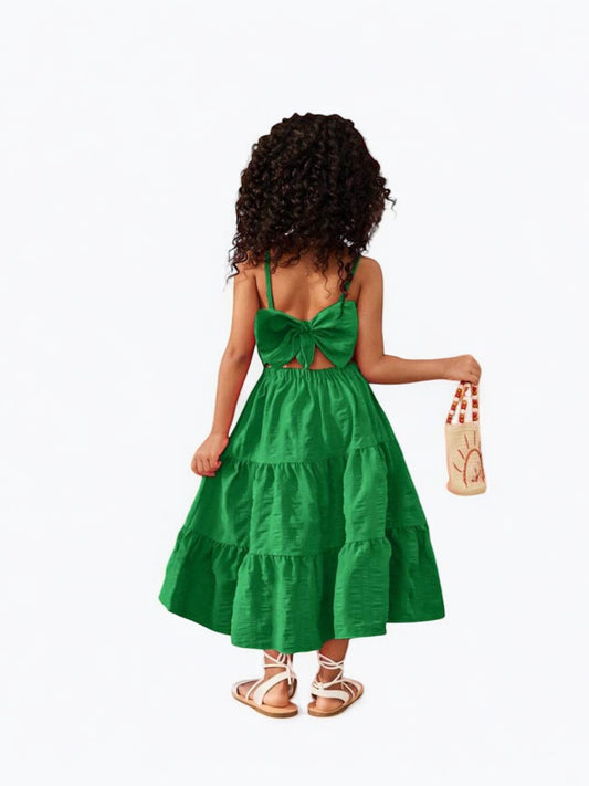 Green girl dress with bow at the back
