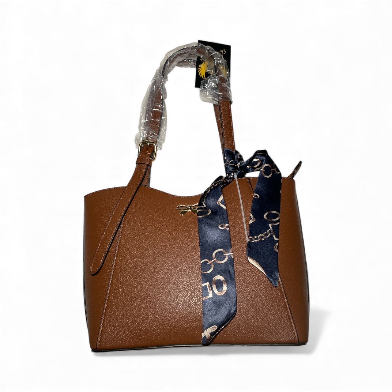 Brown purse with attached scarf