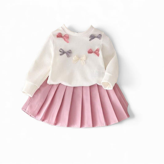 Sweater top with pleated pink skirt