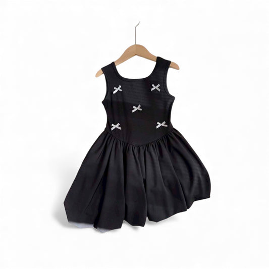 Black dress with white bow