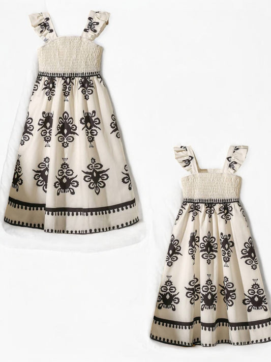 Beige with black design girl dress