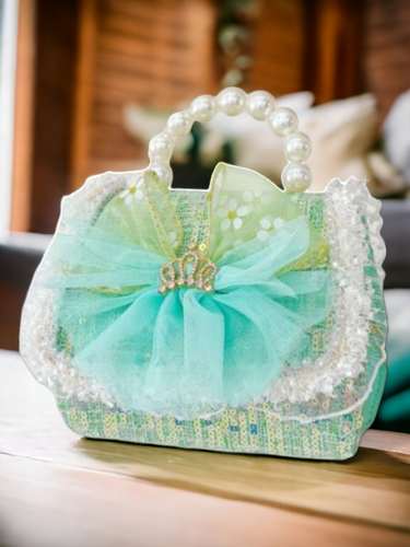 Green princess bow with pearl handle purse