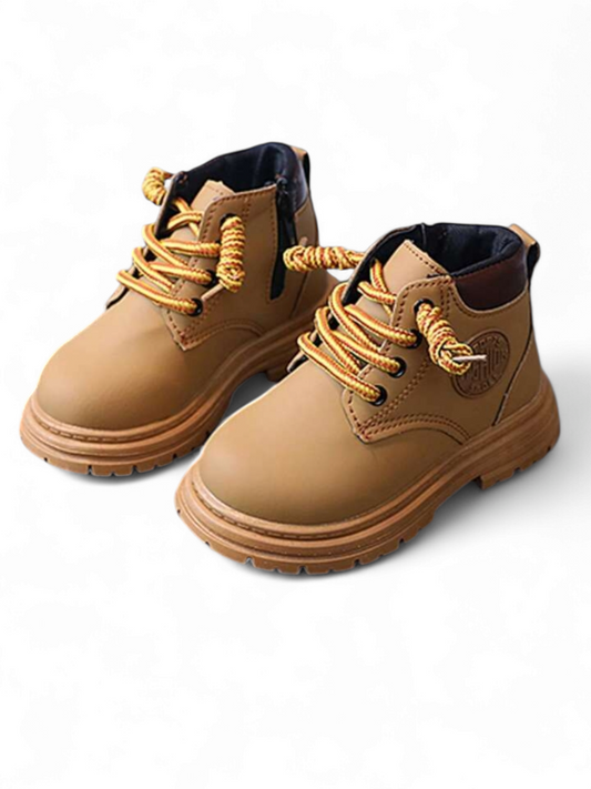 Boy laced up boots